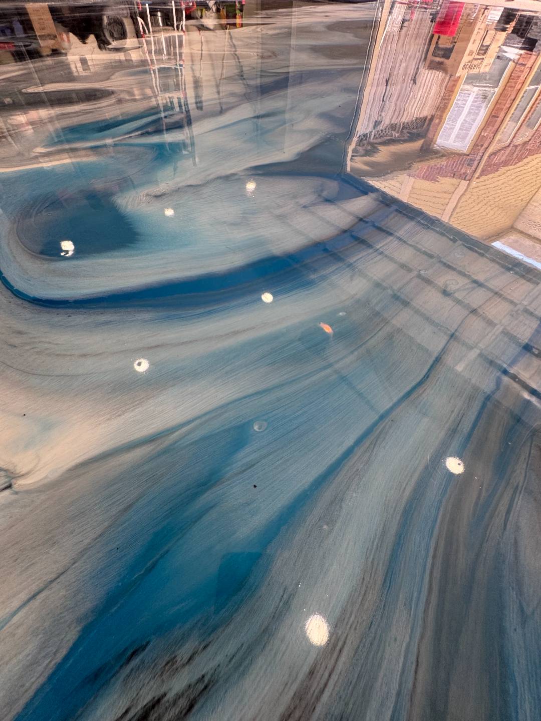 Finished polished concrete floor by Elite Coatings in a modern home
