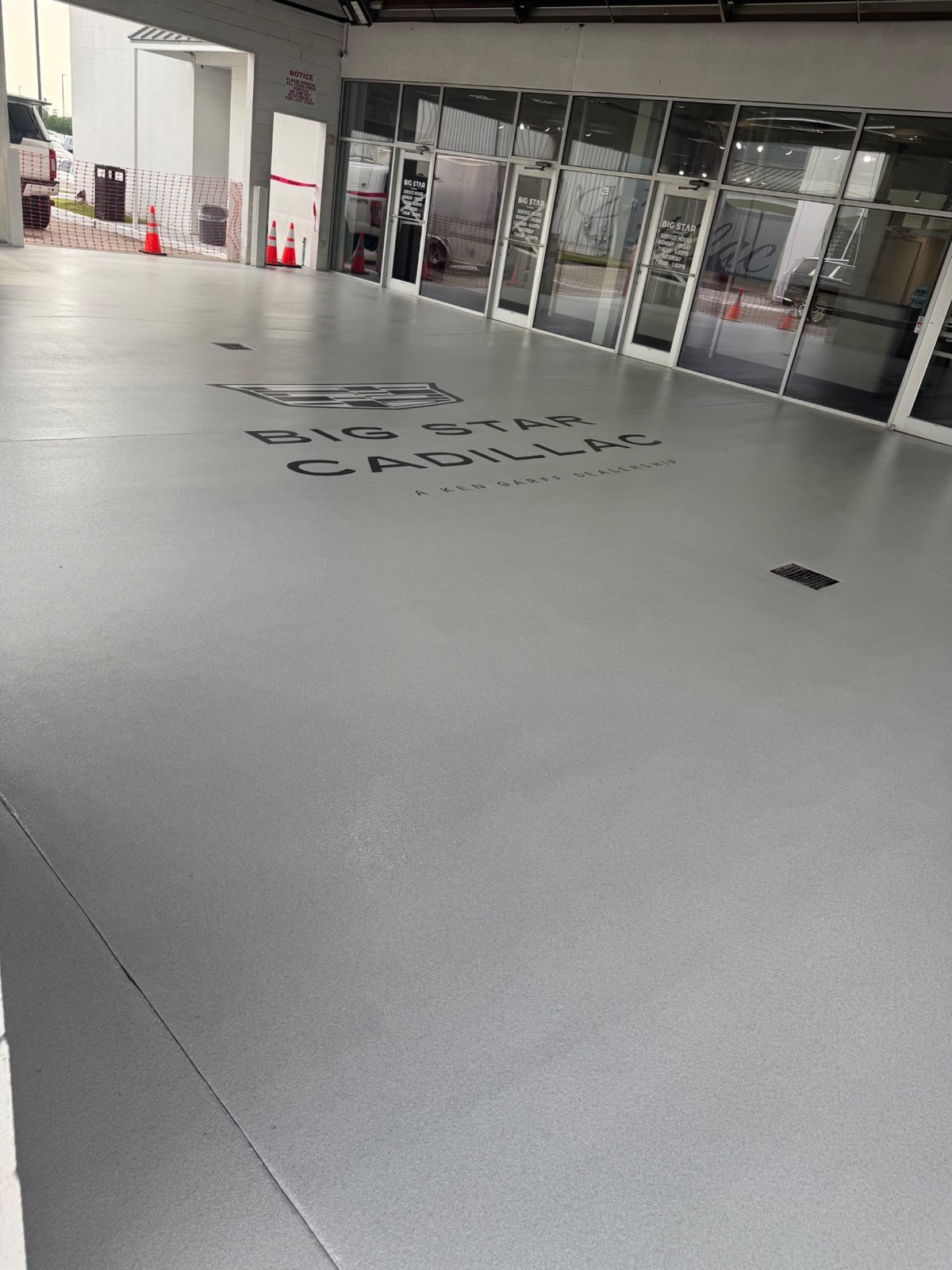 After: finished epoxy floor coating by Elite Coatings