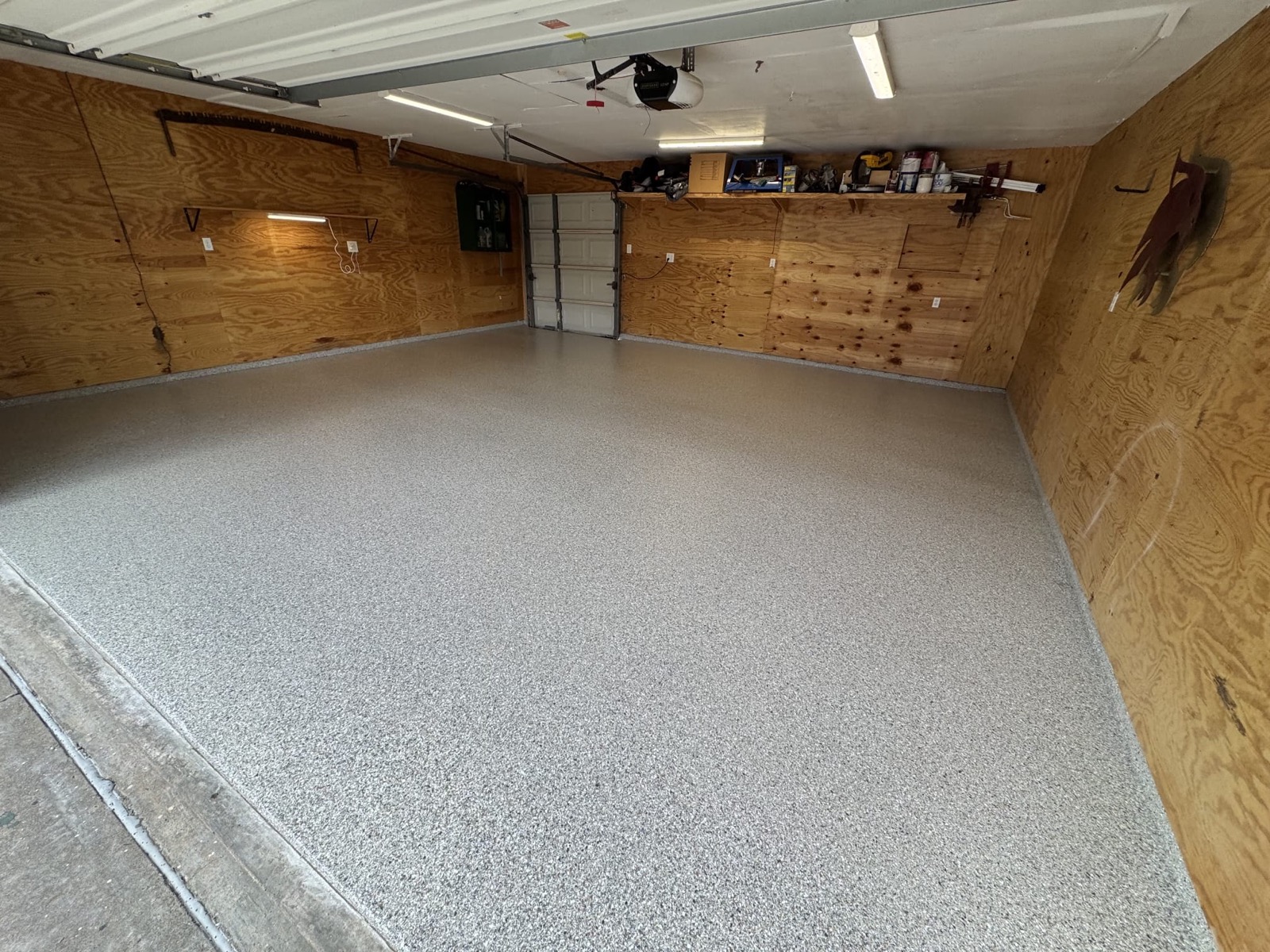 After: completed epoxy floor finish by Elite Coatings